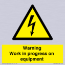 warning-work-in-progress-on-equipmentwith-electrical-hazard-symbol~